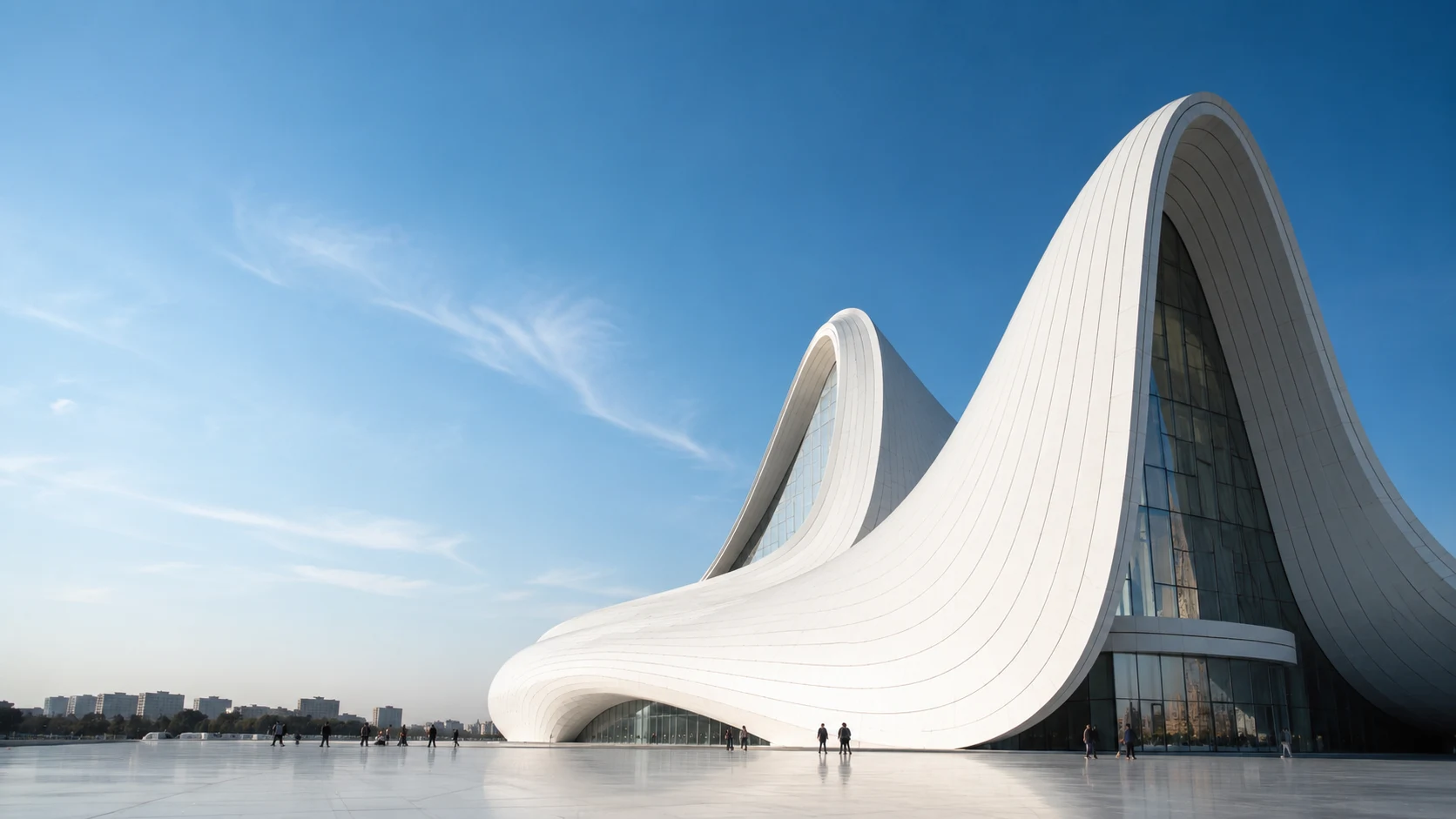 Flowing white architectural form against a clear sky